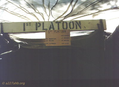 First Platoon Hooch
John Keller Photo

The A/227 1st Platoon hooch at Camp Radcliffe in late July, 1966. Names were placed there so OPS â€œRunnerâ€ could wake up the right Pilots for early flights.
