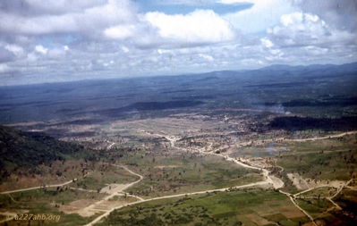 Golf Course at An Khe
Ed Lemp Photo: "E" Btry (Avn) 82nd Arty
Aerial view of the Golf Course at An Khe 9/65

With permission from Ed Lemp
     http://edlempsvietnampicturepages1965-1966.com/
