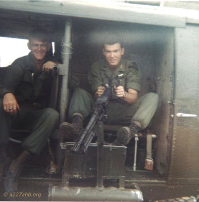  At LZ Betty, Phan Thiet in late 1967
Gordon Lewis Photo

On the left is Neal Heape,  The pilot behind the machine gun has been identified as 1LT David Dewey by Steve Davidson.  
