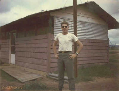 WO-1 John Keller in front of A Company Commander's Hooch
John Keller Photo

April 1967, Camp Radcliffe
