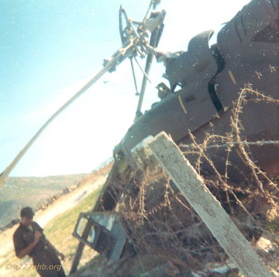 Crash at An Khe
Milo (Mike) Schlaudraff Photo

Unknown aircraft number and unknown soldier

