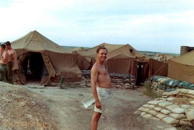 Lt Belco with child
Jay Dirnberger Photo
