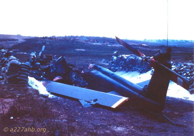 A/227 Flightline Aftermath
John Woods Photo 

Camp Evans Ammo Dump Explosion
May 19 - 20, 1968

