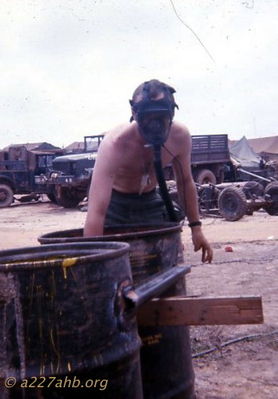 Agent Orange Drums
Bob Witt Photo

The drums we used for holding and heating the water, Jim Caufman got the drums from the chemical dump and scrubbed them out. You can see the Agent Orange on the side. 
