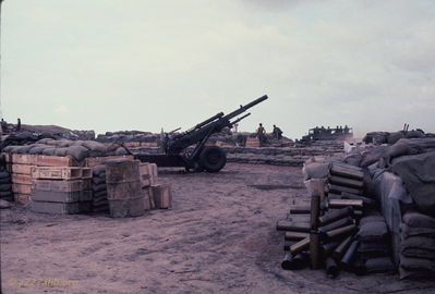 105 Howitizer
Bob Kelly Photo

Howitizer firing position with ammo boxes and shell casings.
