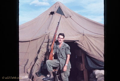 Bob Kelly with Chicom Type 57 Rifle
Bob Kelly Photo

Bob Kelly with a Chicom Type 57 Rifle left over from the French Indo China War. This was brand new in an old weapons cache in the A Shau Valley. I got this from a grunt.

