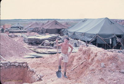 Digging to releave anxiety
Bob Kelly Photo

D/227. Camp Evans. The hole I dug when I was very short. Got rid of some anxiety.

