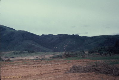 LZ Stud
Bob Kelly Photo

Craters in the vicinity of Khe Sahn. GI's going on patrol (right)

