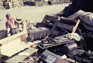 My Area on the morning after
Bob Kelly Photo

My area. Dressers blown down. Cot and table there. Cummings on the left.

