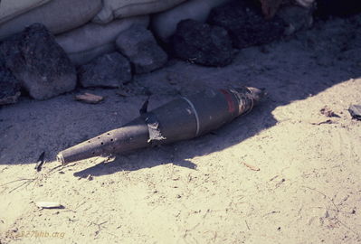Mortar round
Bob Kelly Photo

Here's the mortar round that crashed through my floor by the bunk. EOD got it out but stuckit over my sandbags because they were to busy to defuse.

