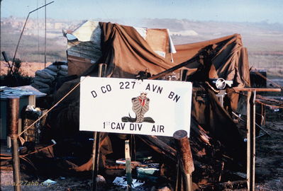 D/227 sign
Bob Kelly Photo

The sign is barely touched and the tent behind is destroyed and burned at little.

