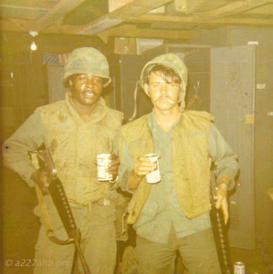 After a hard day at work!
Tony Thornton Photo

Unknown on left, Tony Thornton on right.


