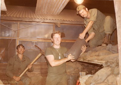 Reinforcing the Bunker (1st guy name unknown, 2nd guy Bob ?, 3rd guy Marvin Picket 
Dennis Howell Photo
