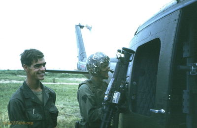  Phan Thiet POL with Scotty Colligan (left) 1967 
JP Edwards Photo

The individual on the right, wearing a helmet, is identified as Eddy Esposti, Gunner, (by Wayne Driver).
