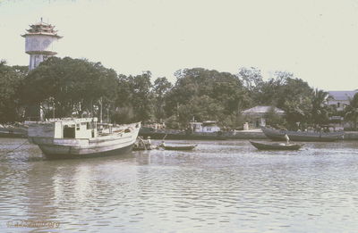  Phan Thiet fishing boat; note water tower on the far side of bay '67 
JP Edwards Photo
