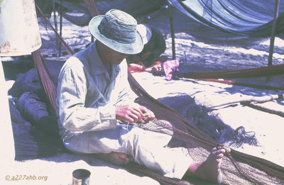  Phan Thiet fisherman mending net '67 
JP Edwards Photo
