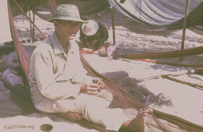  Phan Thiet fisherman mending net '67 
JP Edwards Photo

