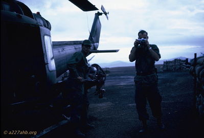 Ernie Kramer and Kelly
Bob Kelly Photo

Ernie Kramer taking picture. Kelly is at left by Huey.
