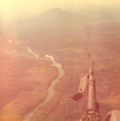 Song Be River
Randy Hankins Photo

This is the Song Be River where that Loach went down. They are putting in an airstrike where the gooks are. Thats where we landed and took Beu Coop Fire.
Lai Khe, 1968 - 1970

