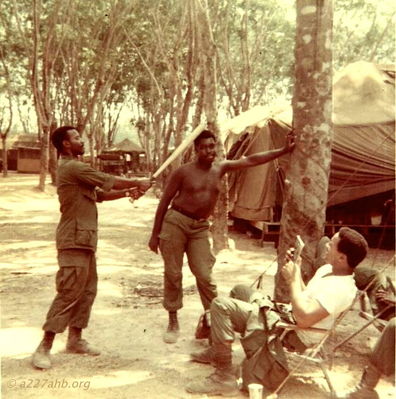 Unknowns 
David Priest Photo

Lai Khe 1969
Can anyone help with first names or home towns?
Please send that information to the web site or contact David Priest or Joe Leonard by email.
