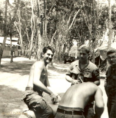 Mike Scovel and Unknowns
David Priest Photo

Lai Khe 1969
Can anyone help with first names or home towns?
Please send that information to the web site or contact David Priest or Joe Leonard by email.

