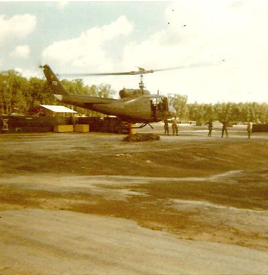 Photo of chopper with part skid torn off.
Dwayne Guidry Photo

Lai Khe 1970 - 1971
