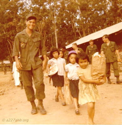 Dwayne Guidry on Christmas Day 1970 with orphans from nearby village, our company fed them and gave them presents.
Dwayne Guidry Photo

Lai Khe 1970 - 1971
