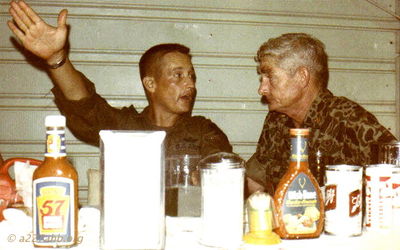 Unknown on left, LCDR Jack H. Bridges, USN on right 1970
"The man on the right was my Dad, LCDR Jack H. Bridges, USN who came up from Saigon and spent a couple of days flying with us. You will note that his fatigues appear to be different from ours.    Gary J. Bridges, Col (RET) "

Ted Grossman Photo

