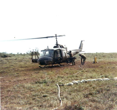 Gunship 012
Rickey McKay photo

 D/227 Gunship #012 refueling, unknown location 
