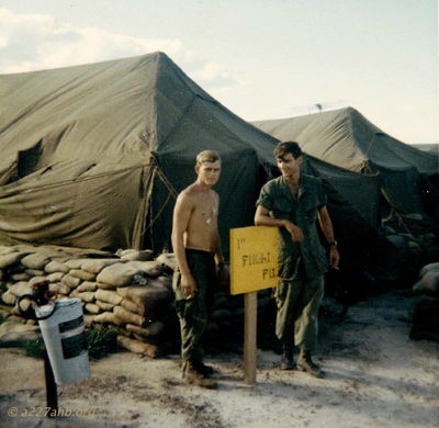 Ted
Rickey McKay photo

 Myself and Ted in front of first flt. platoon tent 
