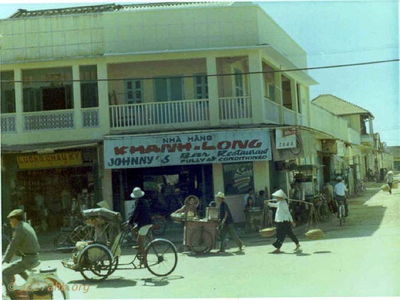 Johnny's
Tom Johnson Photo

Johnny's Bar in Downtown Phan Thiet. We were allowed to go into the city, about a 2-3 mile ride from the airport if we had transportation. We'd get our hair cut while downtown and also visit the MACV compound where there was a small PX. Johnny's Bar was air conditioned! - and had hamburgers and cold beer - well maybe Water Buffalo burgers.

