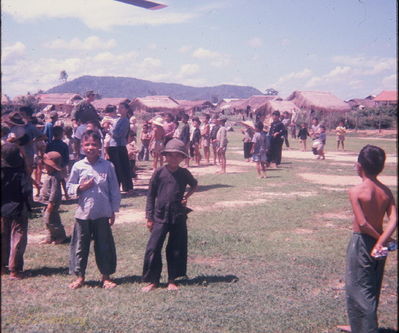 Thien Gao
Bob Kelly Photo

Thien Gao kids, adults, huts. Doctor at left center of photo

