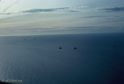 Over South China Sea
Bob Kelly Photo

Nice shot of Huey's over the South China Sea, positioning for a two ship LZ. Combat Assault near Twin Lakes. Into forest?

