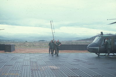 After a Blade Change
Jim Puhala Photo

Phan Thiet
If you took a round at or near the leading edge of a rotor blade, it needed to be changed. A major exercise! Then the track of the blade needed to be checked to make sure everything was lined up properly.

