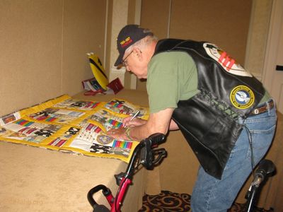 Signing the reunion quilt
Lillian Burbank Photo
