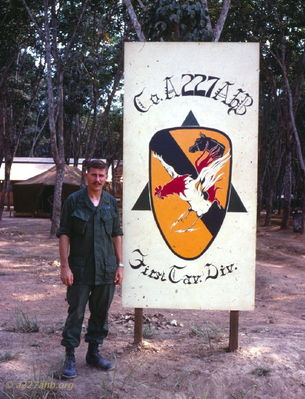 Wayne Trucke at 227th Sign
Wayne Trucke Photo

 1969  Lai Khe

 In country long enough to grow a mustache but not long enough for R&R. My wife made me shave it off during R&R in Hawaii. 
