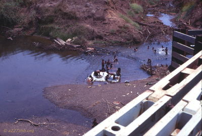 Locals washing and playing in the river. Believe this was near Saigon. 
Wayne Trucke Photo

1969
