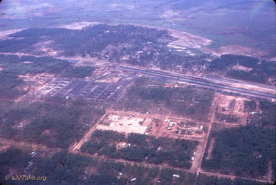  Lai Khe 1969
Wayne Trucke Photo

I believe A227th company area is located in the trees in the center of the photo. The local village of Lai Khe is across the airstrip from A227th company area. 
