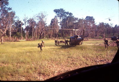 On the ground at LZ. Troops unloading
Wayne Trucke Photo

1969
